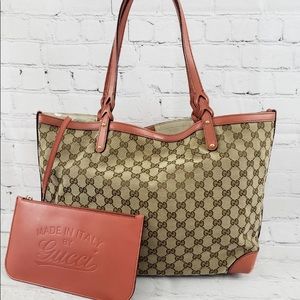 💯 % Authentic Gucci canvas tote with pouch